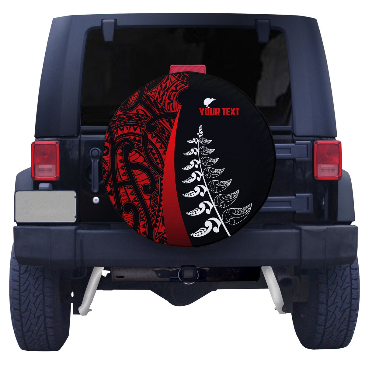 Spare tire cover: black with red Maori pattern and white fern graphic on vehicle