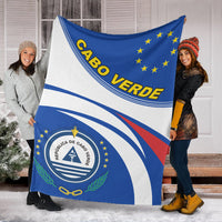 Cabo Verde blanket draped on people, blue and white flag design with stars