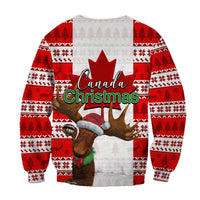 Red-and-white Canada Christmas sweater with moose wearing Santa hat, full front view