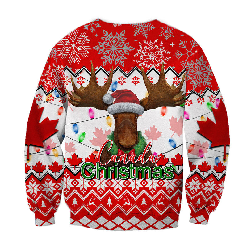 Red Canada Christmas sweatshirt with moose head, Santa hat, maple leaves, and geometric knit