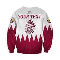 Unisex white Qatar sweatshirt back: 'YOUR TEXT' over maroon flag pattern and Arabic emblem