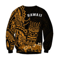HAWAII text back sweatshirt with gold tiki mask and floral hem; dark base