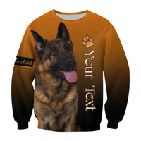 Orange unisex sweatshirt with German shepherd portrait, paw icon, and vertical text