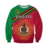 Red-and-green sweatshirt front with Vanuatu lettering and central warrior emblem
