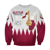 Light gray front sweatshirt with Qatar National Day logo, map flag, and eagle graphic