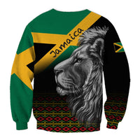 Green and black sweatshirt with yellow Jamaica text and gray lion head graphic