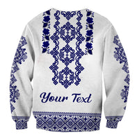 Unisex sweatshirt, light gray with blue folk embroidery and Your Text on back.
