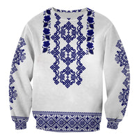 Unisex sweatshirt, light gray with blue folk embroidery pattern, full back view.