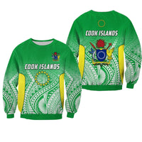 Green unisex sweatshirt, front Cook Islands graphic with island pattern sleeves