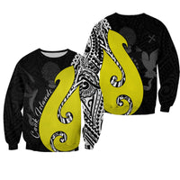 Black crewneck sweatshirt with large lime fish-hook mural and Polynesian patterns