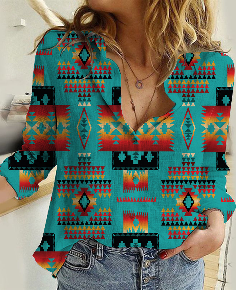 Women’s turquoise linen shirt with multicolor geometric Native-style pattern, long sleeves