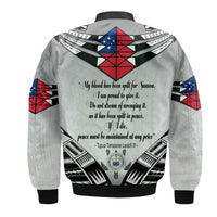 Back of white unisex bomber jacket with black trim, red-blue emblem, and printed quote text