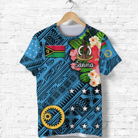 Blue Sanma T-shirt with tribal patterns, floral accents, and Sanma text, front view