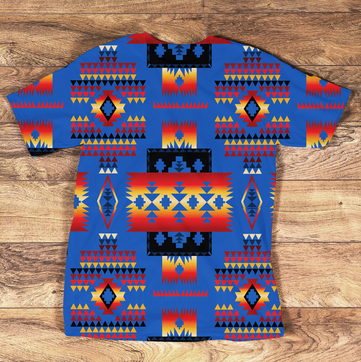 Multicolor native-style T-shirt with bold geometric patterns on blue background
