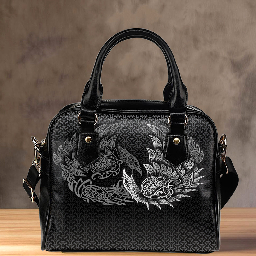 Black shoulder handbag with winged Viking pattern and two top handles
