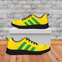 Casual sneakers in yellow with green stripes, black sole, lace-up design