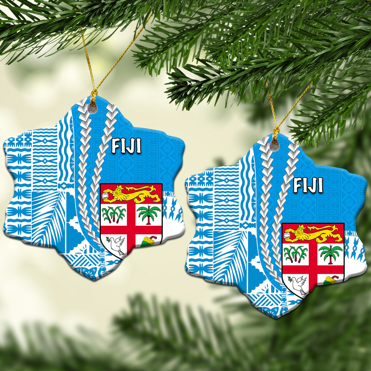 Two Fiji star ceramic ornaments with blue tropical patterns, crest and “FIJI” text, hanging