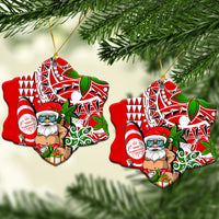 Mele Kalikimaka Santa heart-shaped ceramic ornaments with red, white, and green artwork
