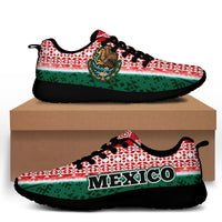 Red sporty sneakers with Aztec pattern and lion crest, black sole, Mexico text