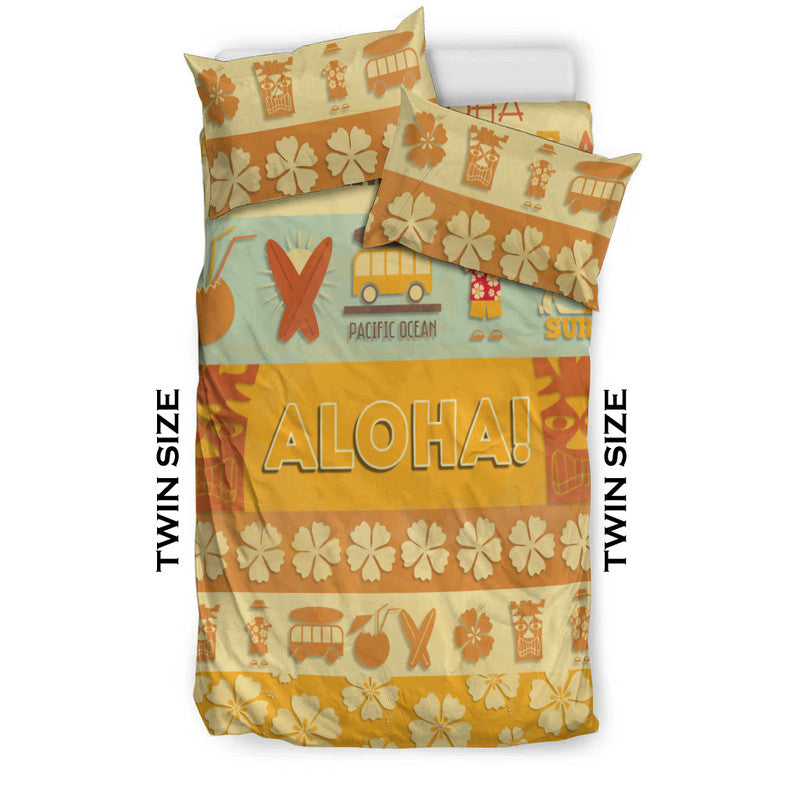 Twin size bedding set with ALOHA! lettering, floral row, and surf-and-tropical icon graphics