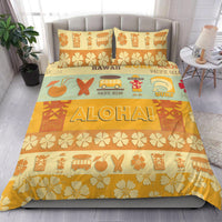Yellowish Hawaii surf bedding set with ALOHA! text, tropical icons, and floral pillow covers