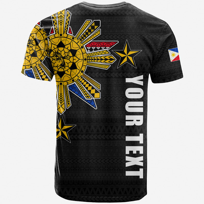 Black tribal graphic T-shirt, back view, gold sunburst with vertical white text