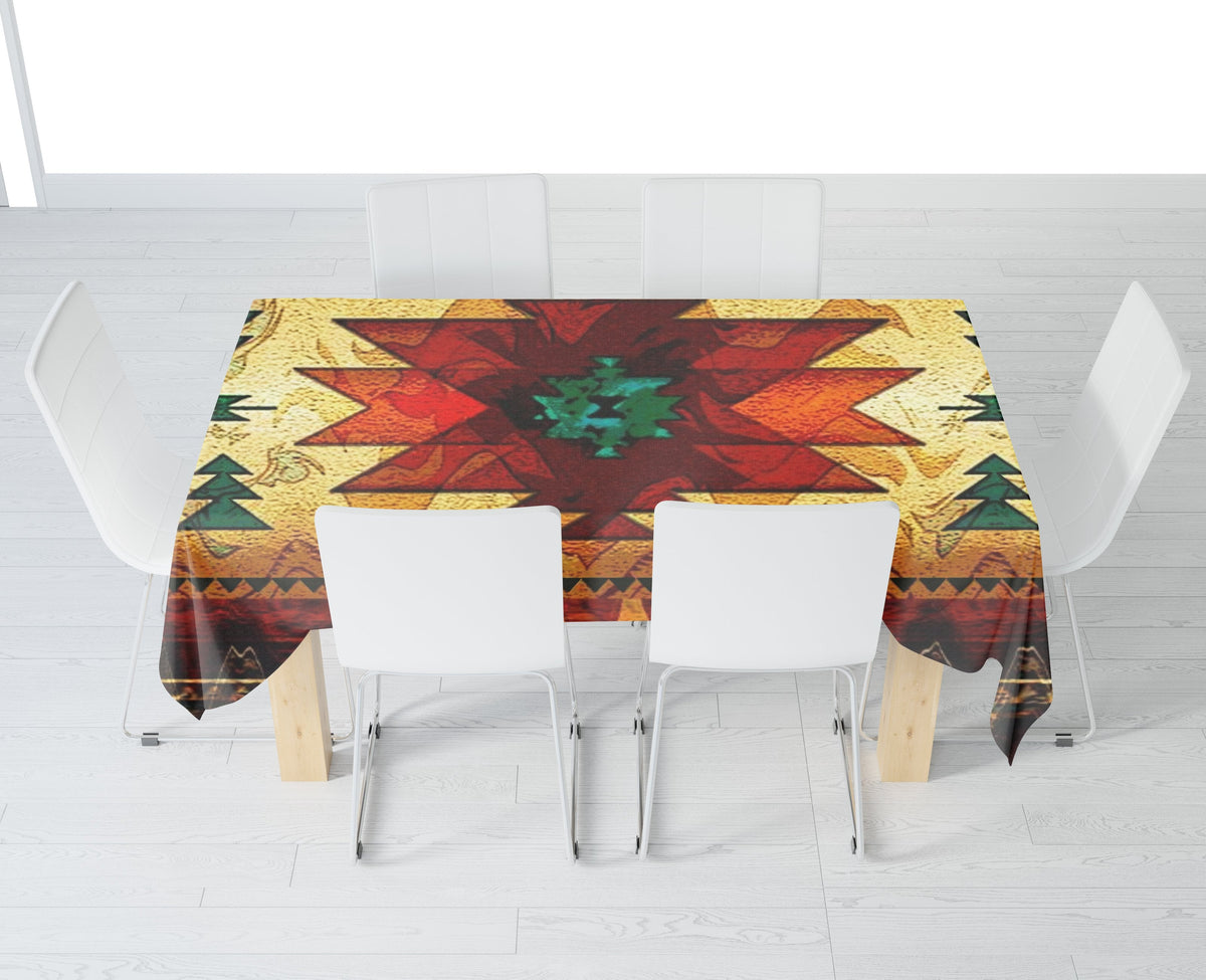 Multicolor tribal tablecloth covering table, red star center with zigzag and arrow borders