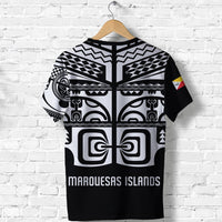Black T-shirt with large white tribal print on back and 'MARQUESAS ISLANDS' text