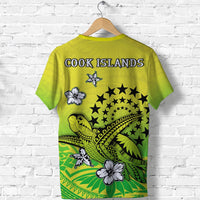 Yellow-green graphic T-shirt back with “COOK ISLANDS”, turtle, stars, and flower icons