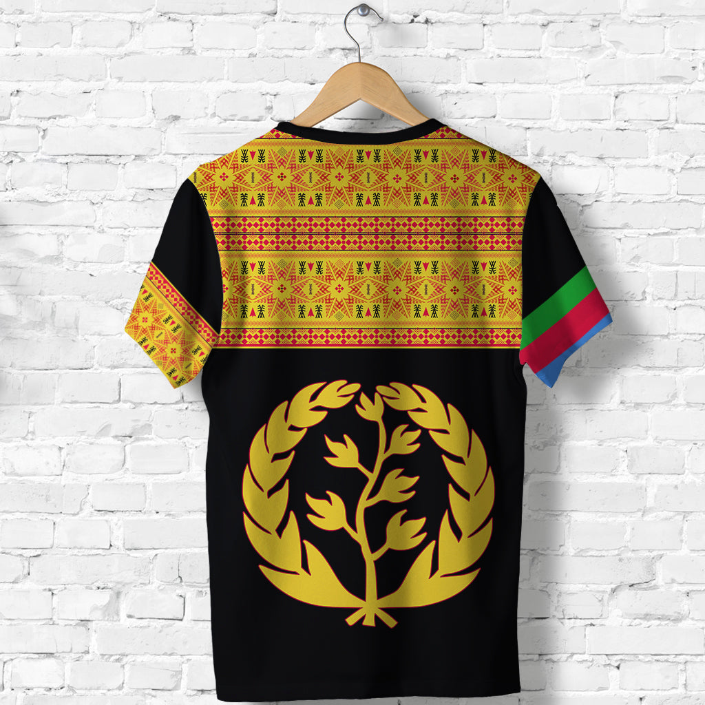 Black T-shirt back with large gold emblem tree, colorful woven band and flag sleeves