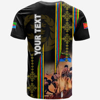 Black T-shirt back view with vertical rainbow stripe, gold pattern, lion and crowd photo