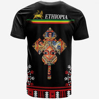 Black tee back with 'ETHIOPIA' text, lion emblem, and colorful cross design