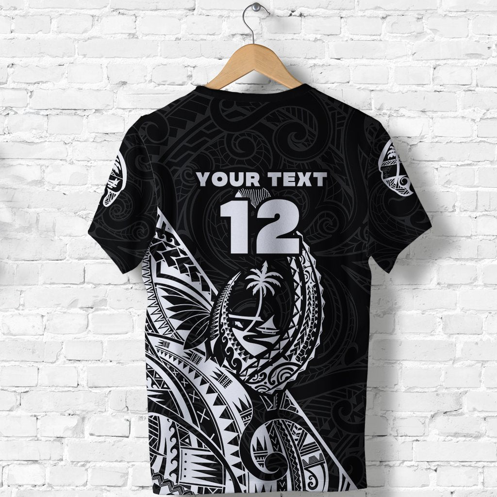 Black back of rugby T-shirt with large '12' and Polynesian face pattern