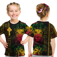 Kids reggae T-shirt with lion and cross print, vertical gold emblem stripe, black base
