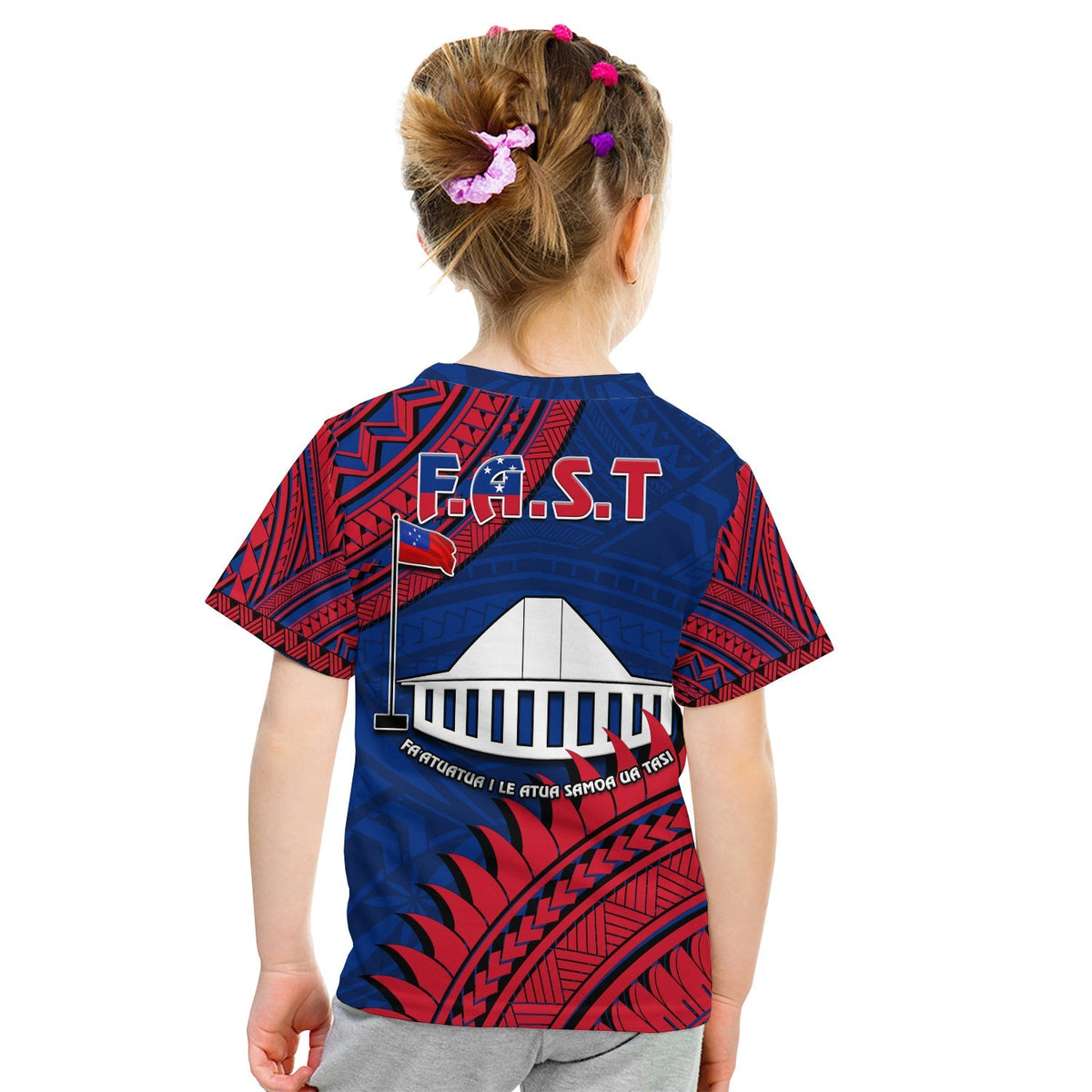 Blue graphic T-shirt back with F.A.S.T flag emblem, white building panel and red tribal waves