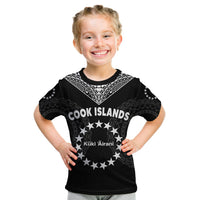 Kids black T-shirt with sea turtle circle graphic and star pattern, front