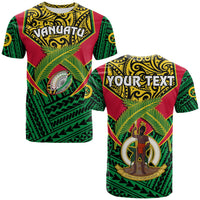 Green and burgundy rugby t-shirt with yellow front crest, leaf motif, and tribal pattern