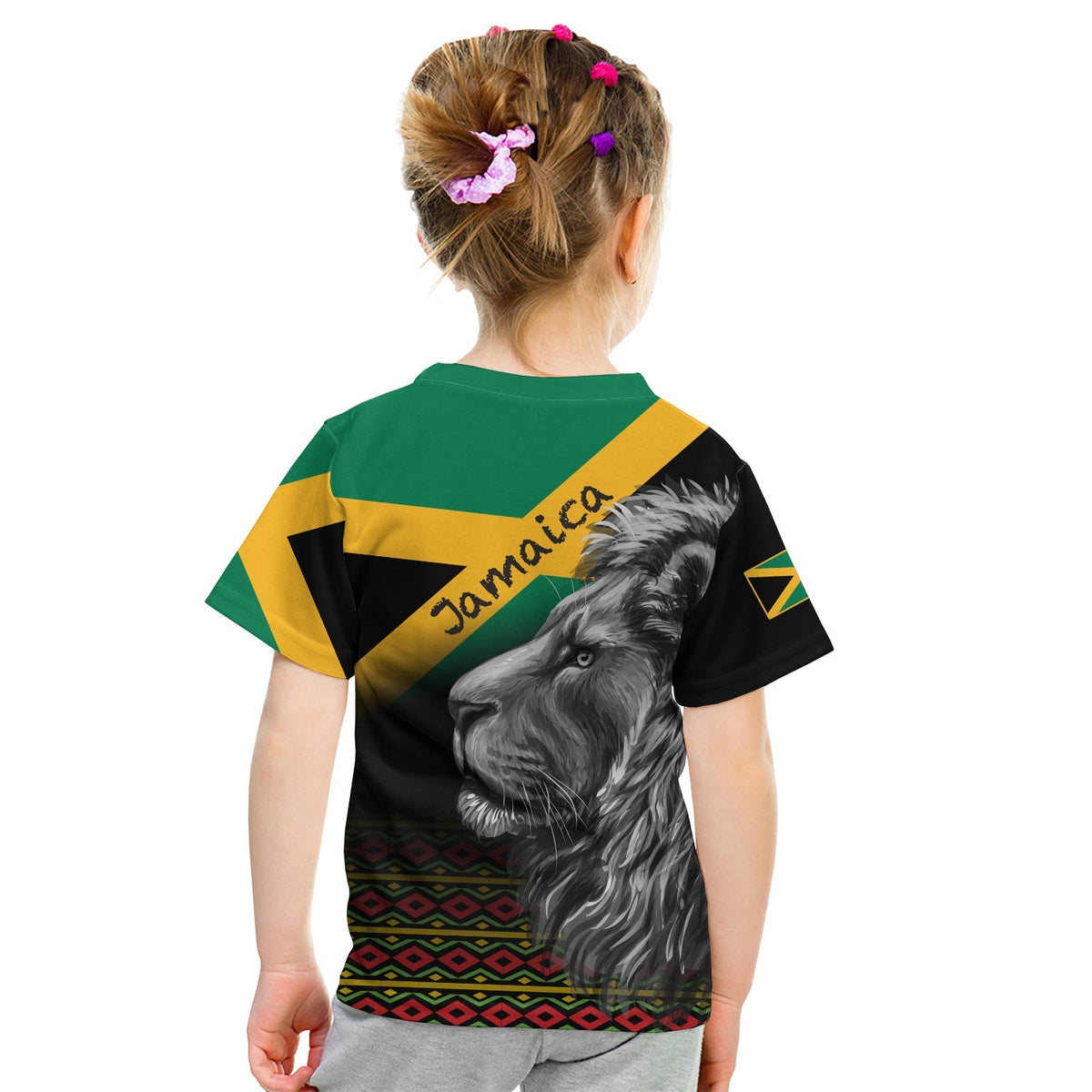 Kids' black T-shirt with 'Jamaica' text and gray lion head graphic on back.