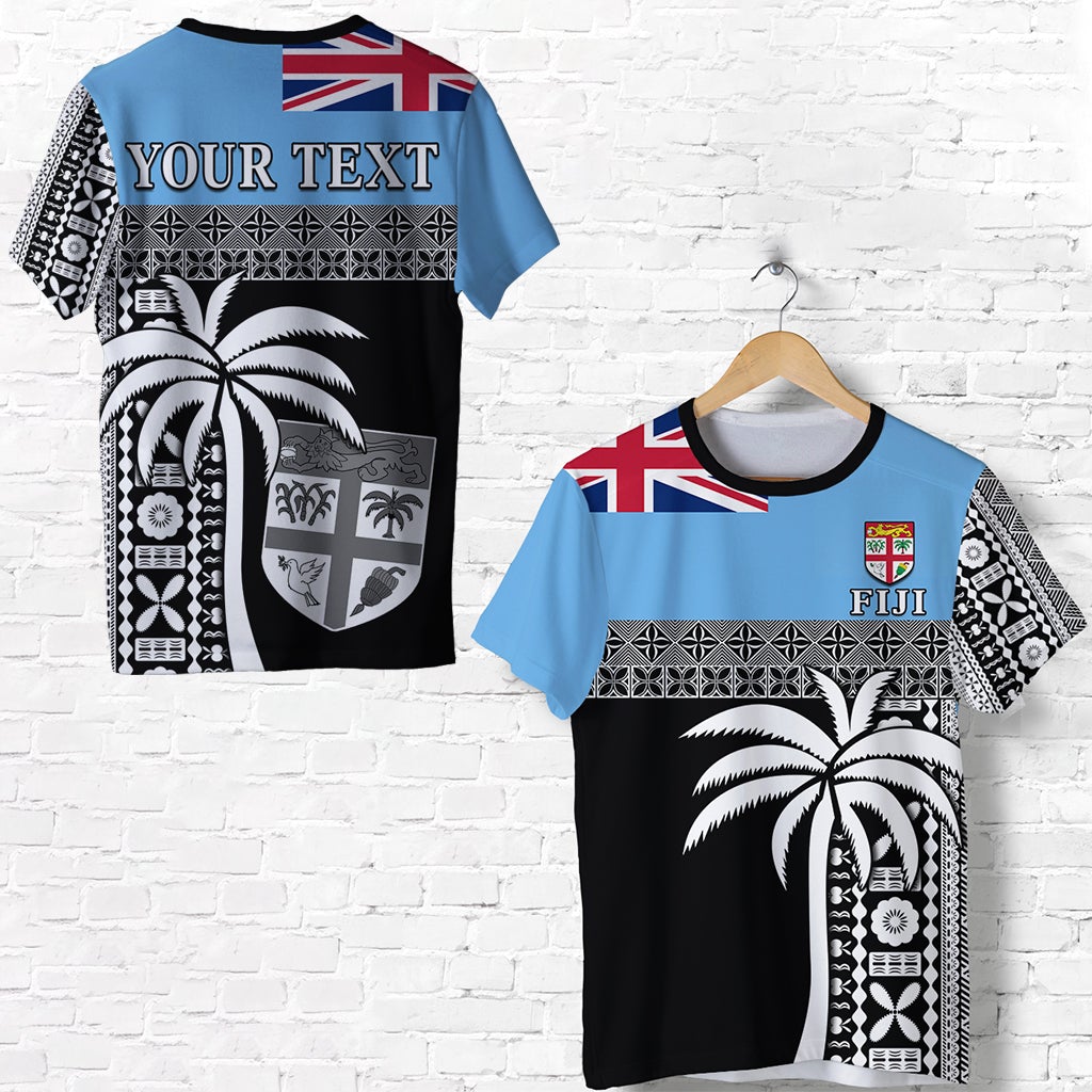 Blue short-sleeve T-shirt with Fiji flag, custom text, and tapa pattern