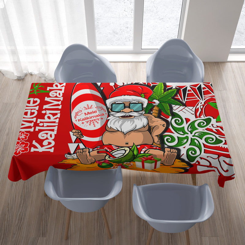 Red beach tablecloth with Santa Claus, holly leaves, and Mele Kalikimaka print