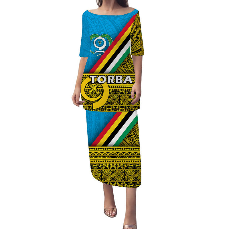 Blue long puletasi dress with bold diagonals and gold geometric print, round neckline