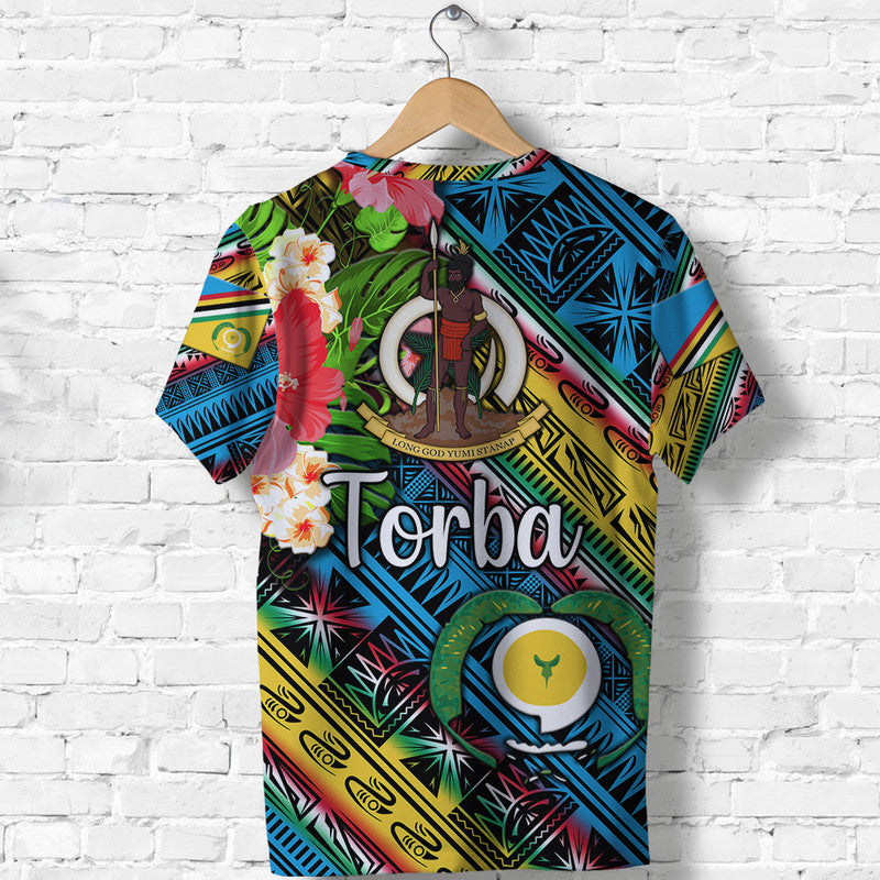 Blue Torba T-shirt with tropical tribal print, “Torba” text and emblem—back