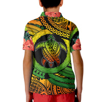 Turtle graphic polo shirt with tropical leaf and hibiscus print, short sleeves, back view.