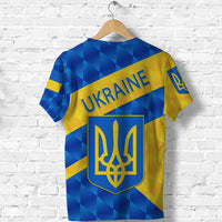 Ukraine sporty T-shirt, back view with blue-yellow geometric pattern, text UKRAINE and emblem