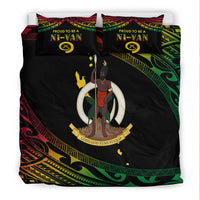 Front view of black duvet cover set with two pillows, Ni-Van emblem and tribal border