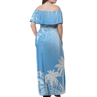 Off-shoulder long dress, back view with ruffle neckline and flowing skirt panel print