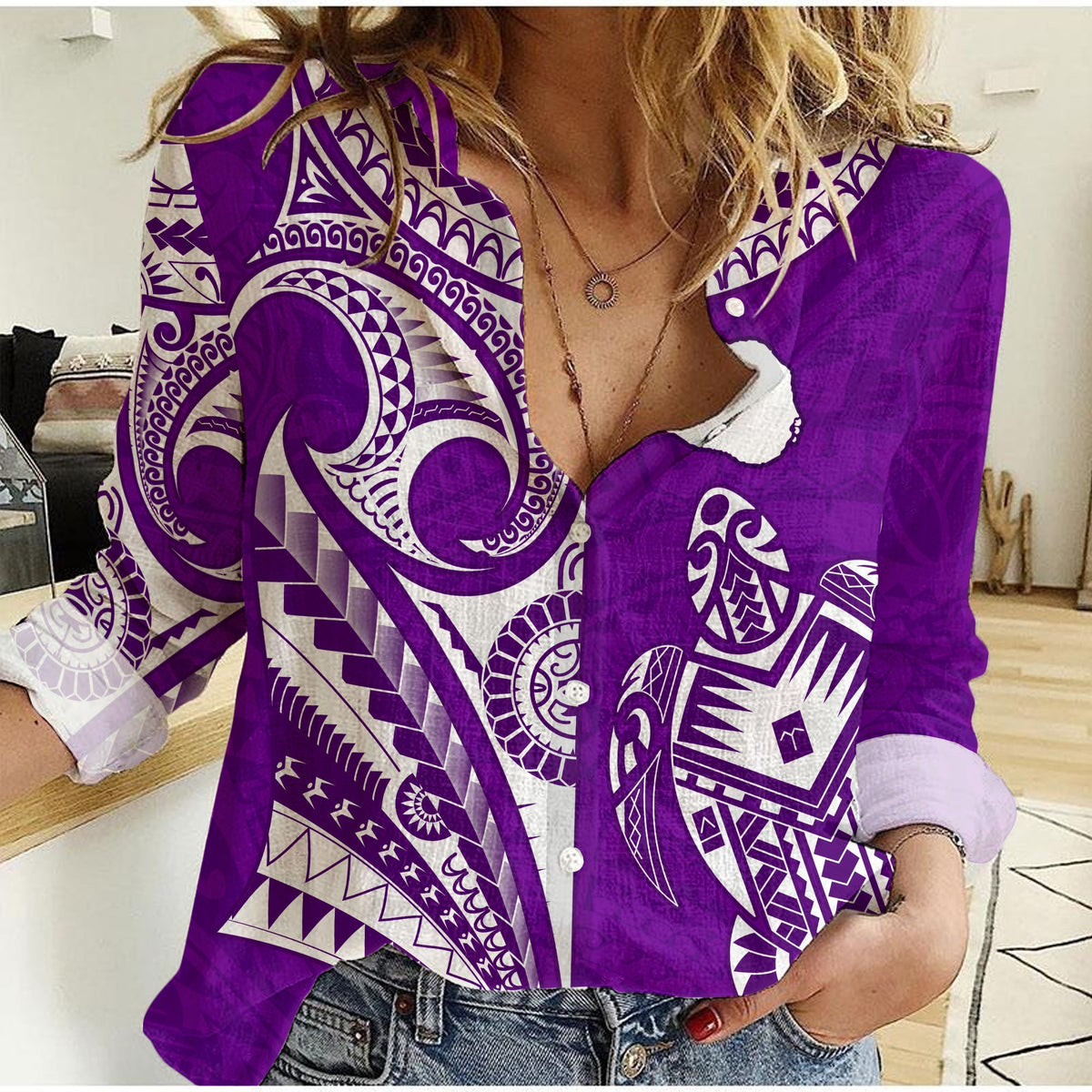 Purple women's casual shirt with open collar and turtle/map style white graphic print