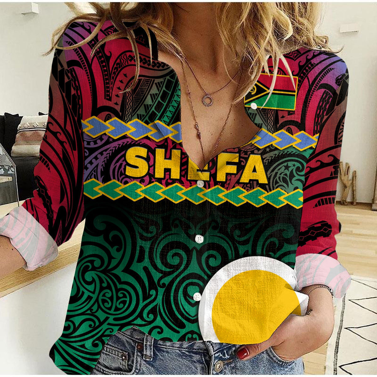 Women’s casual shirt with multicolor tribal print, chest text, and button front