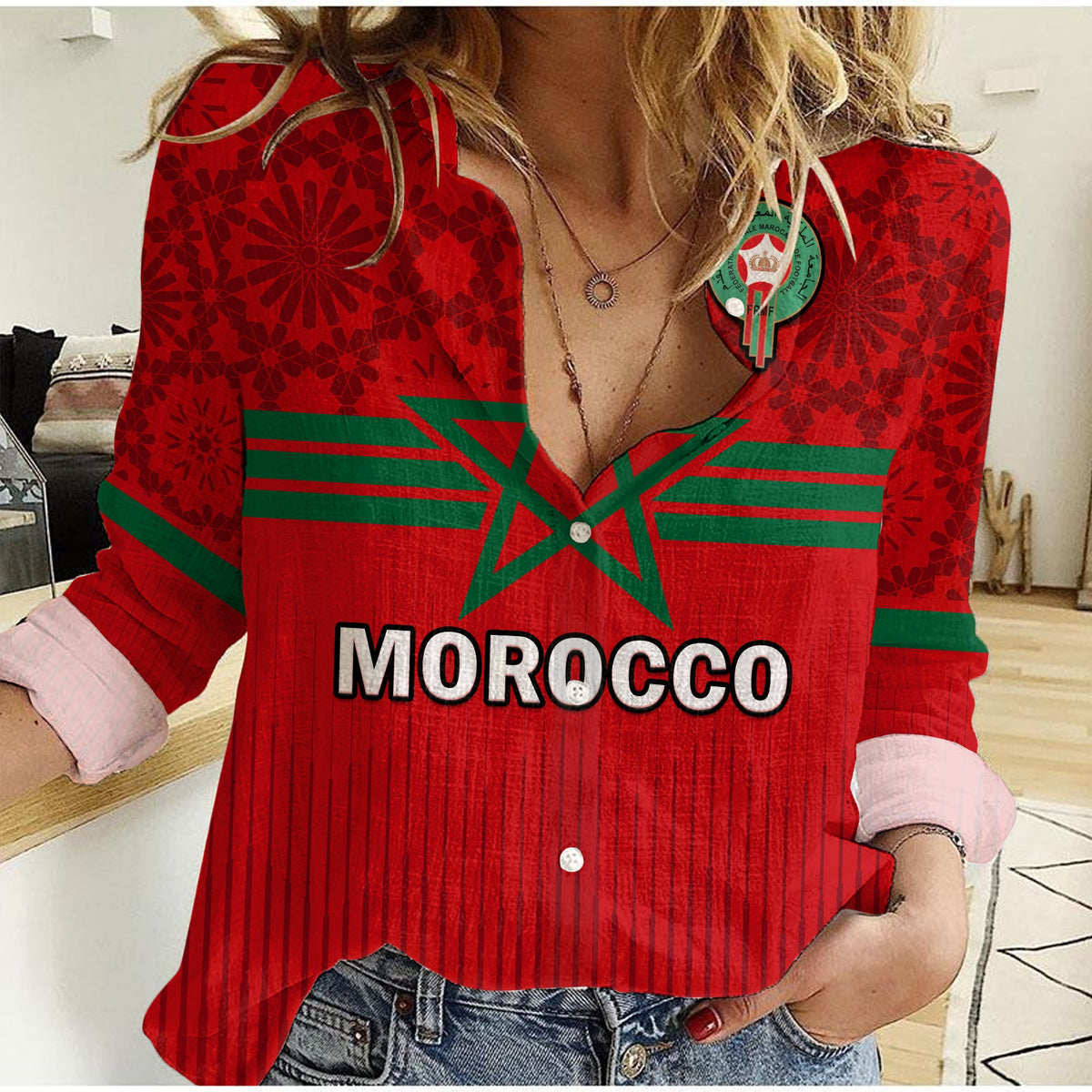 Women’s red casual shirt with green V stripes, patterned sleeves, and button front