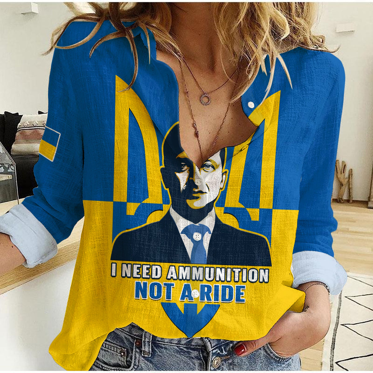 Women's casual button shirt, blue with yellow trident graphic and ammo-not-ride text